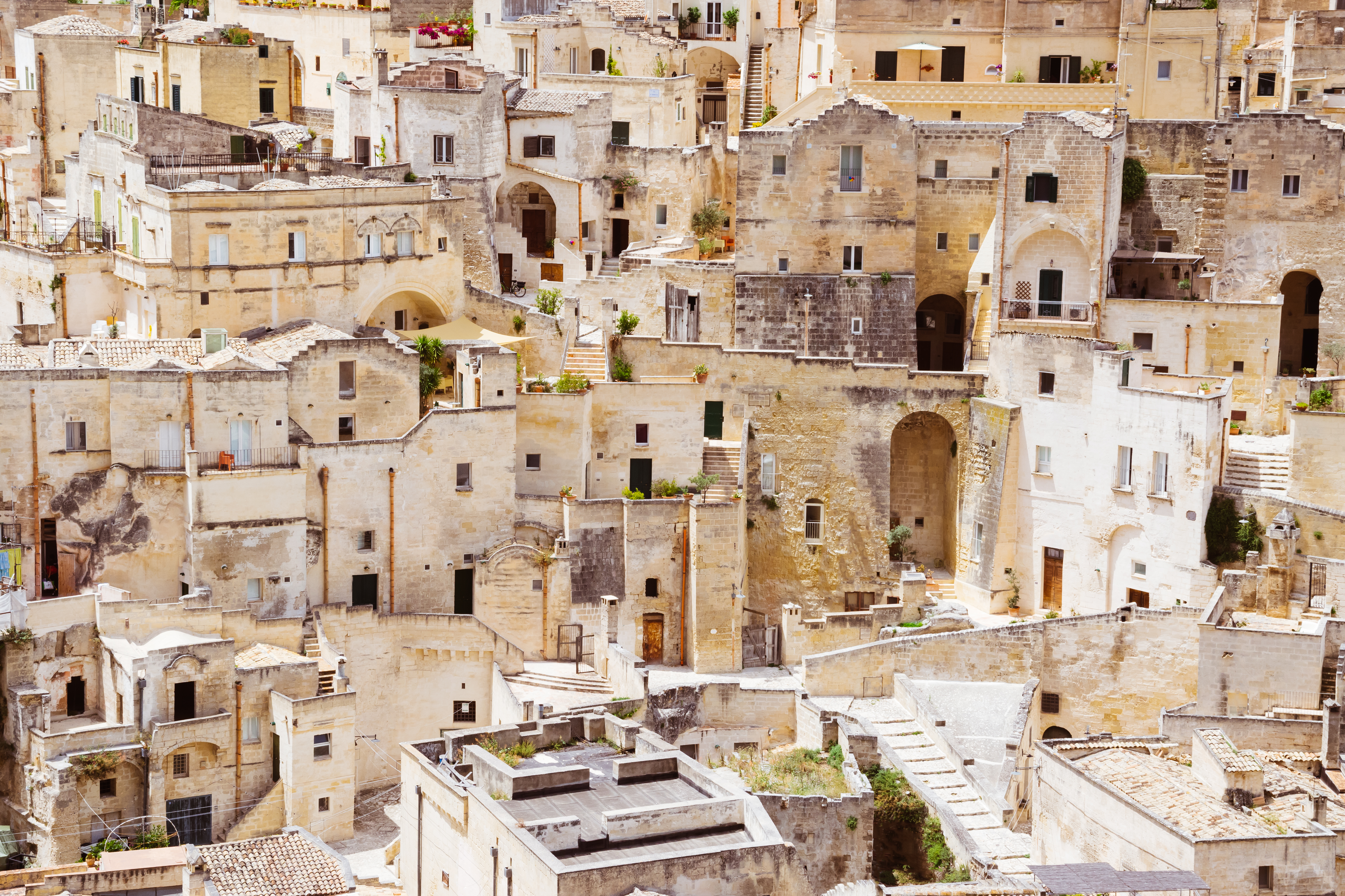 Historiske stenbyggerier og grotteboliger i Matera, Italien